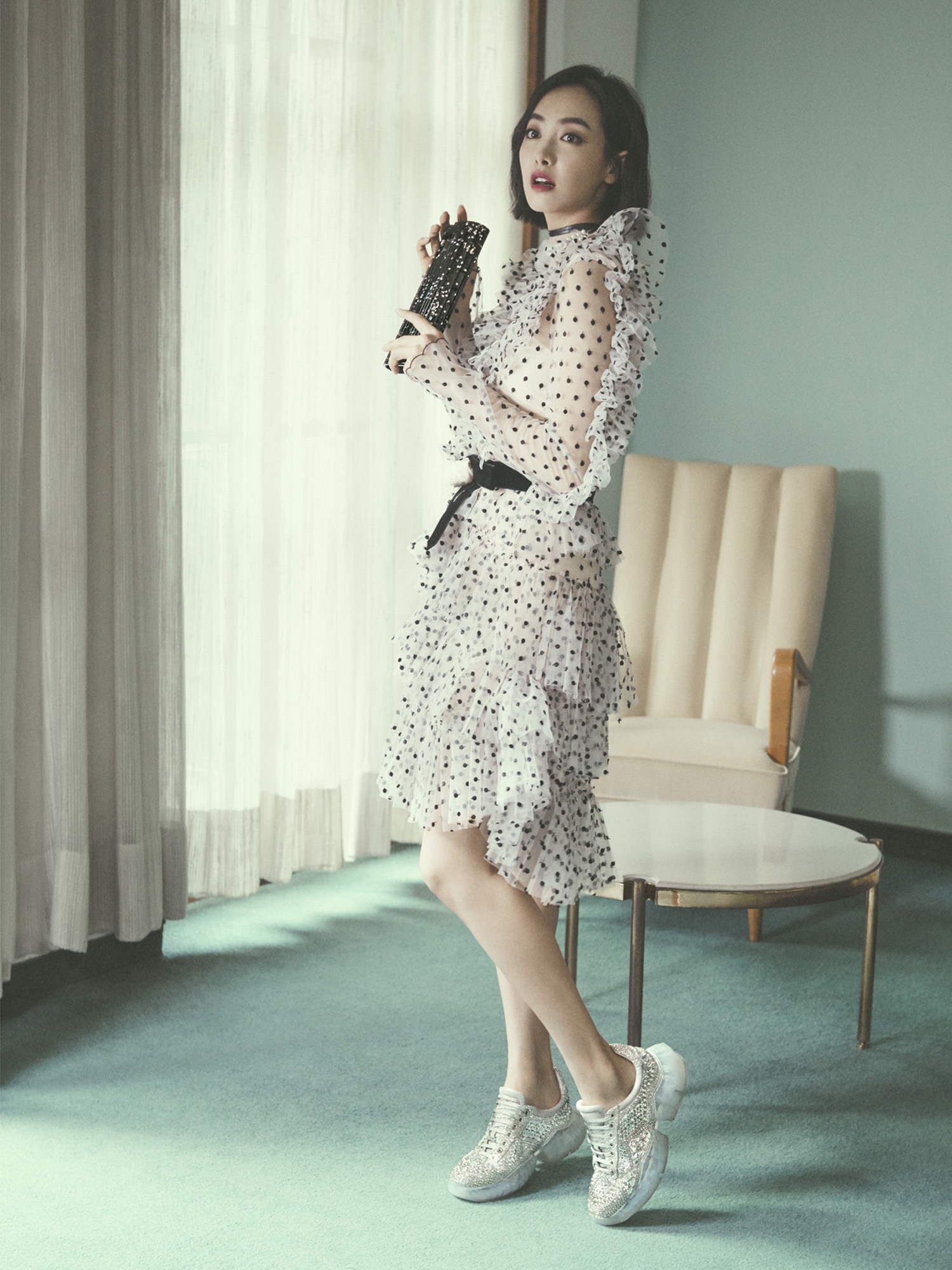 Victoria Song Qian carrying Jimmy Choo SWEETIE clutch bag and wearing DIAMOND sneakers