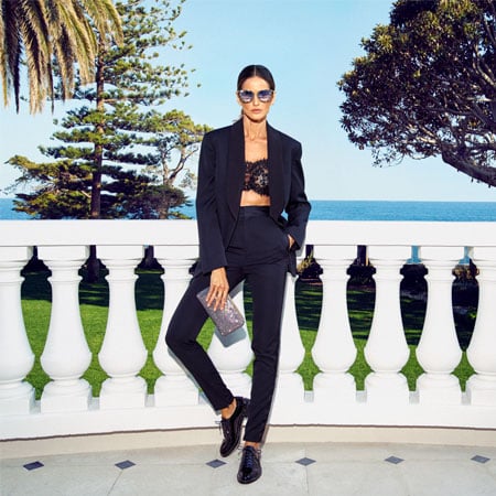 Izabel Goulart wearing REEVE and LIZZY and carrying ELLIPSE