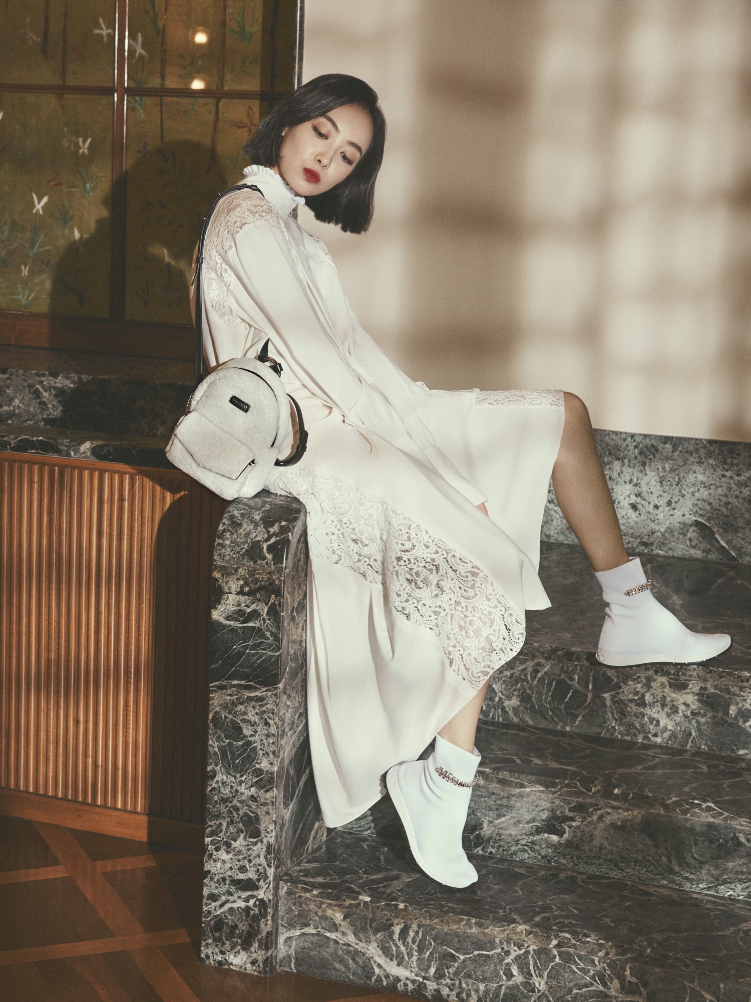 Victoria Song Qian carrying Jimmy Choo CASSIE bag and wearing REGENA trainers